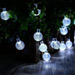 Picture of Solar Garden Lights Outdoor 50 LED 7M/23Ft Solar String Lights Waterproof 8 Modes Outdoor Fairy Lights for Garden Patio Yard Home Party (Clear White)
