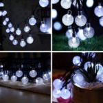 Picture of Solar Garden Lights Outdoor 50 LED 7M/23Ft Solar String Lights Waterproof 8 Modes Outdoor Fairy Lights for Garden Patio Yard Home Party (Clear White)
