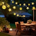 Picture of Solar Garden String Lights 10M/33Ft, 60 LED Warm White Crystal Ball & Star Fairy Lights, IP65 Waterproof Outdoor Decorative Lights with 8 Modes for Garden, Yard, Patio & Home